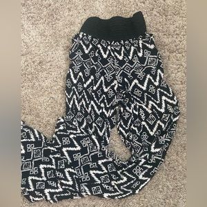 Black and white patterned pull on pants.  100% rayon. Size XS. Very comfortable.